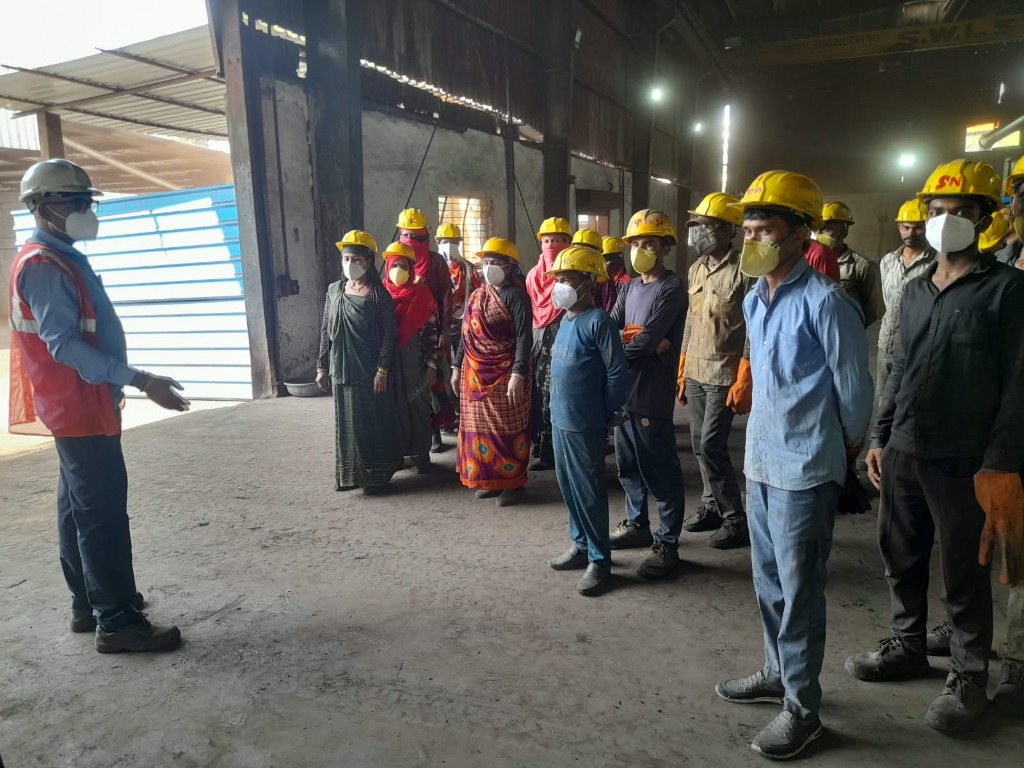 Site safety briefing with team before shift