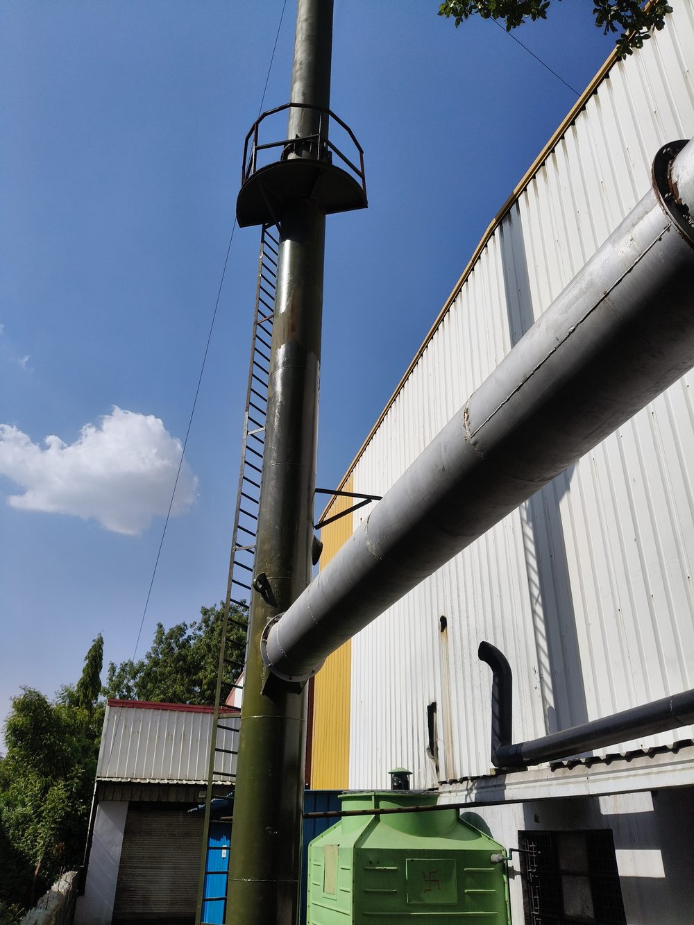 Elevated emission monitoring point on the stack
